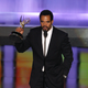Kristoff St. John accepts the award for Outstanding Supporting Actor in a Drama Series at the 35th Annual Daytime Emmy Awards in Los Angeles on June 20, 2008. (Matt Sayles/AP Images)